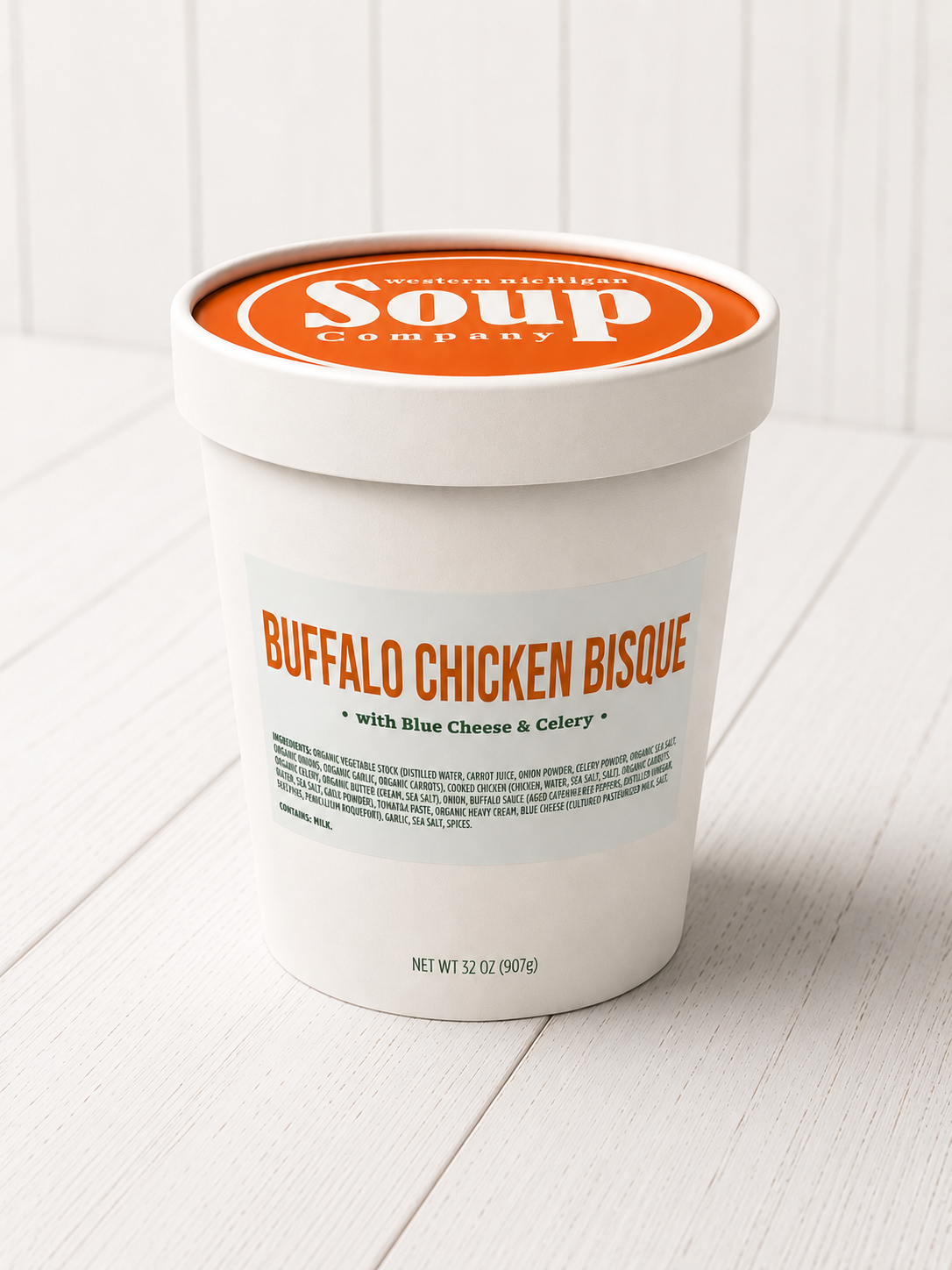Container of Buffalo Chicken Bisque soup with 'Soup Company' branding on a white background