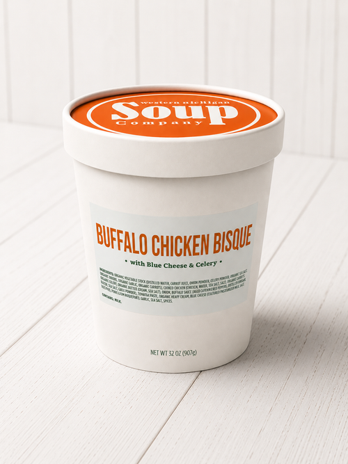 Container of Buffalo Chicken Bisque soup with 'Soup Company' branding on a white background