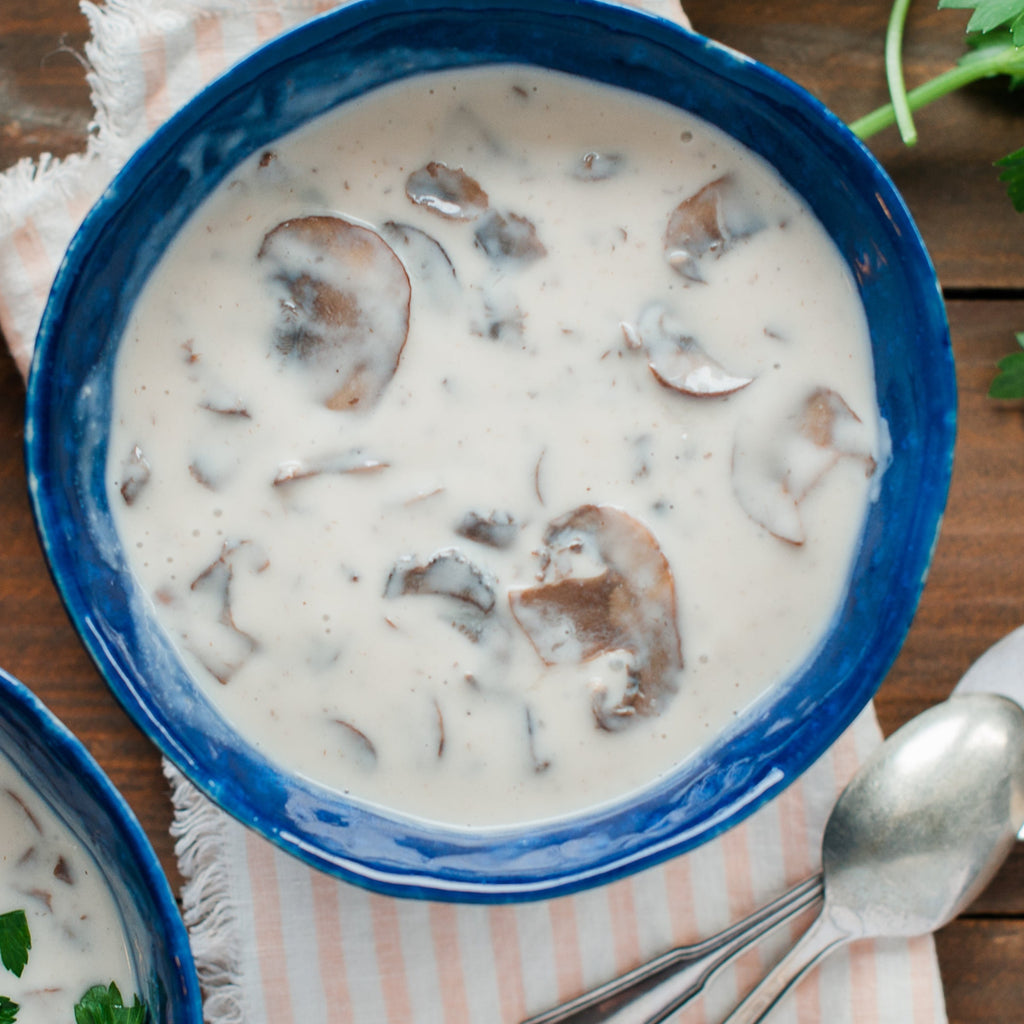 Bowl of Cream of Mushroom Soup with spoon